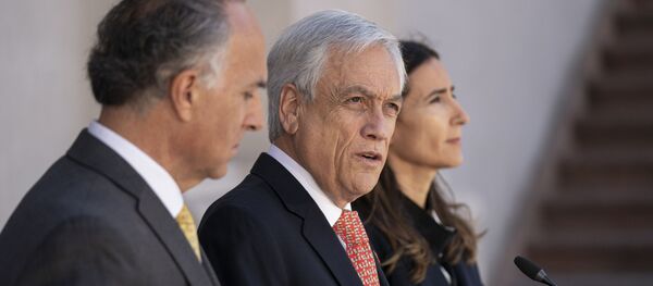 Sebastián Piñera, presidente de Chile (centro) Sebastián Piñera, presidente de Chile (centro) - Sputnik Mundo