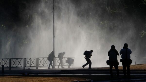 Las protestas en Chile - Sputnik Mundo