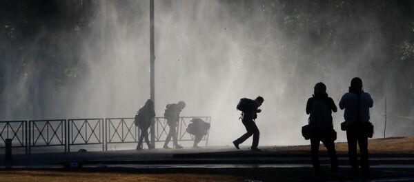 Las protestas en Chile - Sputnik Mundo