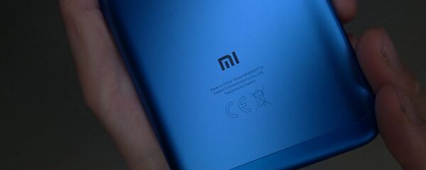 Un teléfono inteligente de Xiaomi - Sputnik Mundo