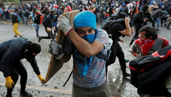 Protestas en Santiago de Chile - Sputnik Mundo