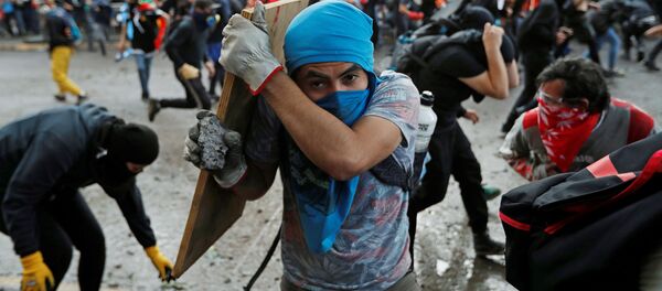 Protestas en Santiago de Chile - Sputnik Mundo