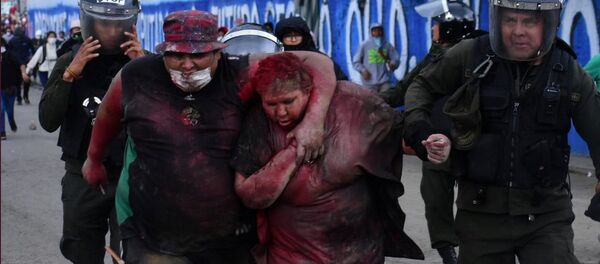 La alcaldesa de Vinto, Patricia Arce, tras sufir un brutal ataque por parte de manifestantes opositores a Evo Morales - Sputnik Mundo
