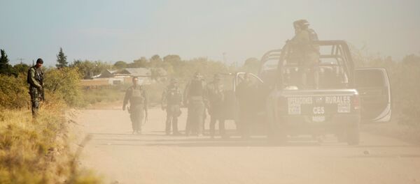 La Policía de México en un operativo - Sputnik Mundo