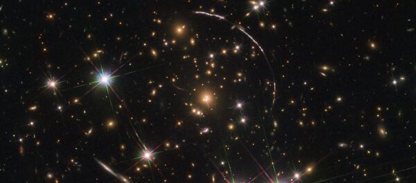 Galaxia Sunburst Arc - Sputnik Mundo