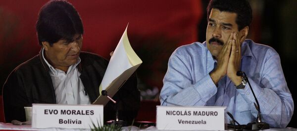 Evo Morales, de Bolivia, y Nicolás Maduro, durante una cumbre del ALBA en 2012 - Sputnik Mundo