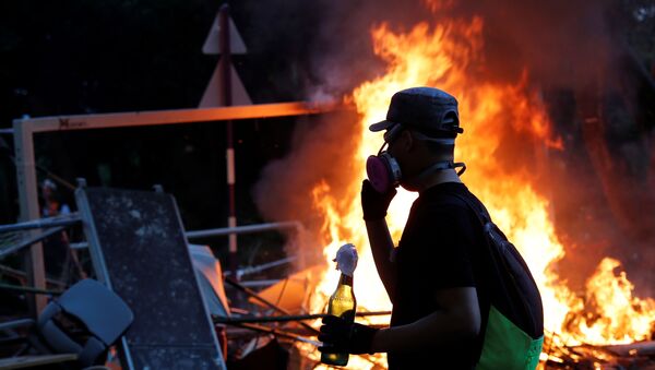 Un manifestante en Hong Kong (imagen referencial) - Sputnik Mundo