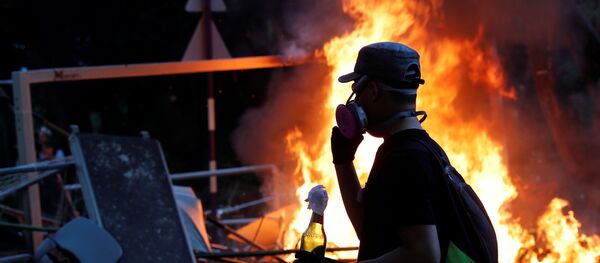 Un manifestante en Hong Kong (imagen referencial) - Sputnik Mundo