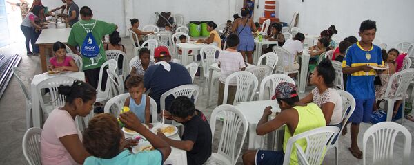 Refugiados venezolanos en Manaos, Brasil - Sputnik Mundo