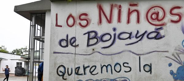 La inscripción Los niños de Bojayá queremos paz - Sputnik Mundo