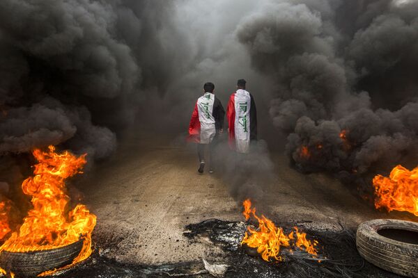 Protestas, modelos e inundaciones: las fotos más destacadas e impresionantes de la semana - Sputnik Mundo