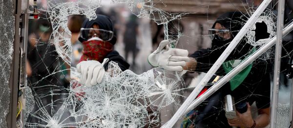 Protesta en Ciudad de México por el Día Internacional de la Eliminación de la Violencia contra las Mujeres, el 25 de noviembre de 2019 - Sputnik Mundo
