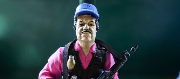 Una figura del narcotraficante Joaquín El Chapo Guzmán - Sputnik Mundo