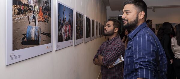 La inauguración de la exposición de fotos de ganadores del concurso Andréi Stenin 2019 en Nueva Delhi  - Sputnik Mundo