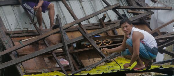Consecuencias de un tifón en Filipinas Consecuencias de un tifón en Filipinas - Sputnik Mundo