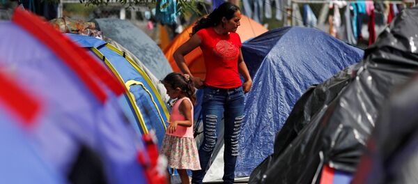 Migrantes centroamericanos en un campamento en Matamoros, México (archivo) - Sputnik Mundo