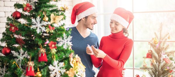 Una pareja en la Navidad - Sputnik Mundo
