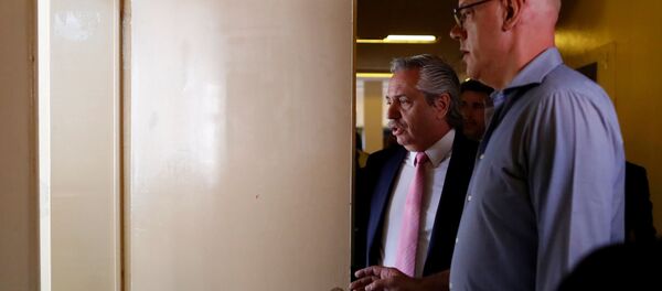 El presidente de Argentina Alberto Fernández espera para tomar examen a estudiantes de la Universidad de Buenos Aires - Sputnik Mundo