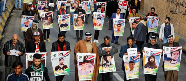 Retratos de los manifestantes muertos en Irak - Sputnik Mundo