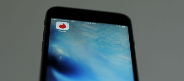 Un ícono de la aplicación de citas Tinder - Sputnik Mundo