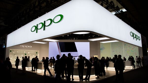 Un estand de Oppo en una feria de tecnología (archivo) - Sputnik Mundo