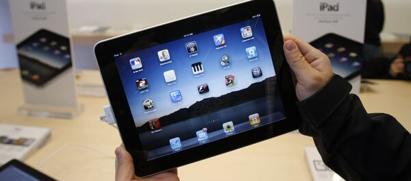 El primer día de ventas de iPad de Apple (2010) - Sputnik Mundo