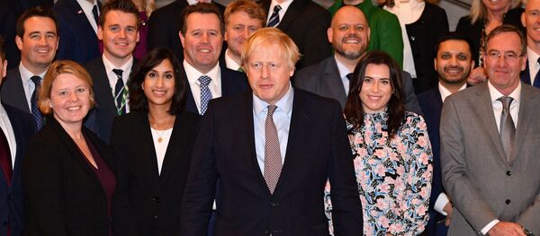 El primer ministro del Reino Unido, Boris Johnson, con el nuevo Gobierno - Sputnik Mundo