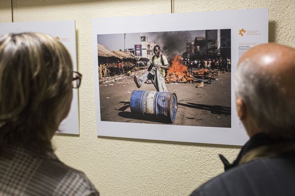 La exposición del concurso Andréi Stenin 2019 en Madrid - Sputnik Mundo