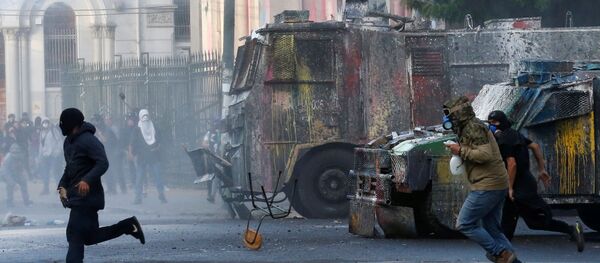 Ola de protestas en América latina - Sputnik Mundo