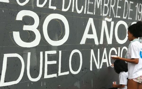 Pintando el mural - Sputnik Mundo