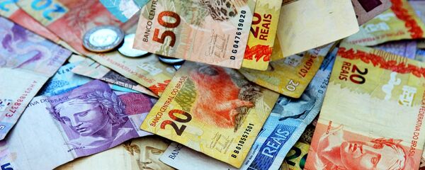 Billetes y monedas de real, la moneda brasileña - Sputnik Mundo