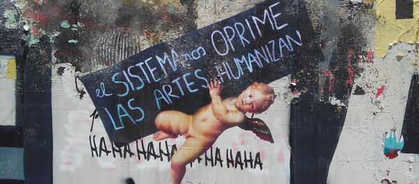 El sistema nos oprime, las artes humanizan - arte callejero en Chile El sistema nos oprime, las artes humanizan - arte callejero en Chile - Sputnik Mundo