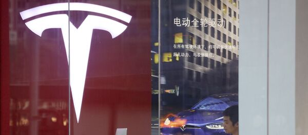 Una tienda de Tesla en China - Sputnik Mundo