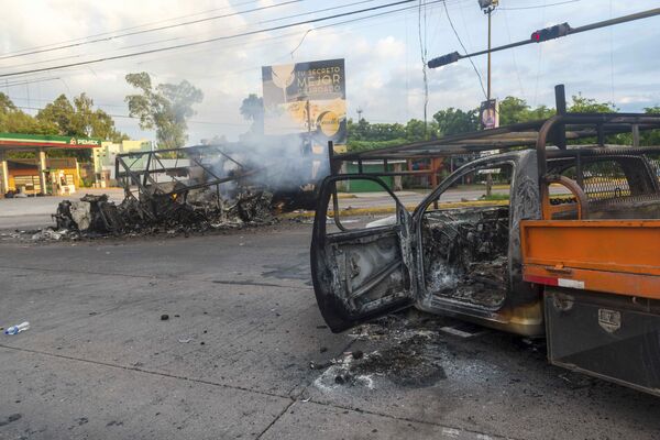 Consecuencias de los enfrentamientos en la ciudad de Culiacán (México), entre las fuerzas del orden y los sicarios de los cárteles, el 18 de octubre de 2019 Consecuencias de los enfrentamientos en la ciudad de Culiacán (México), entre las fuerzas del orden y los sicarios de los cárteles, el 18 de octubre de 2019 - Sputnik Mundo