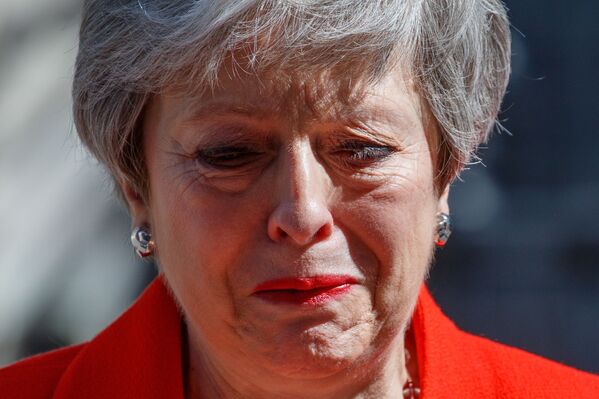 Theresa May, primer ministra de Reino Unido, tras el anuncio de su resignación en Londres, el 25 de mayo de 2019 Theresa May, primer ministra de Reino Unido, tras el anuncio de su resignación en Londres, el 25 de mayo de 2019 - Sputnik Mundo