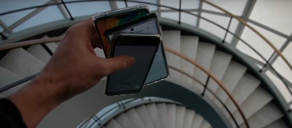 La prueba de fuego de los 'smartphones' más modernos de Apple, Samsung y Huawei - Sputnik Mundo