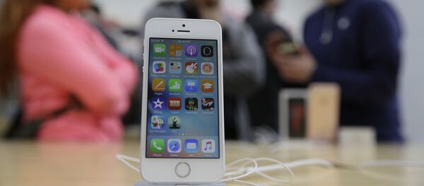 El iPhone SE, foto de archivo - Sputnik Mundo
