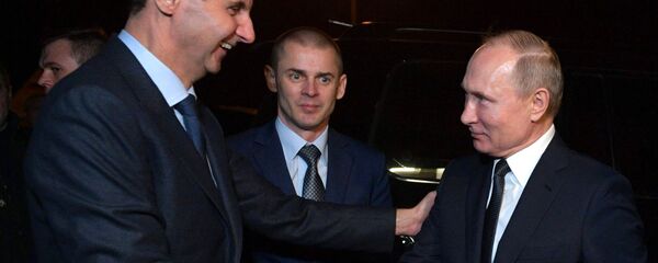 Bashar Asad, presidente sirio, recibe a su homólogo ruso, Vladímir Putin, en Damasco - Sputnik Mundo