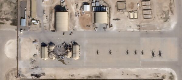 Imágenes satelitales muestran la base aérea Al Asad de EEUU en Irak tras los ataques iraníes - Sputnik Mundo