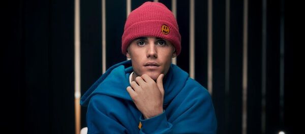 Justin Bieber, cantante canadiense Justin Bieber, cantante canadiense - Sputnik Mundo