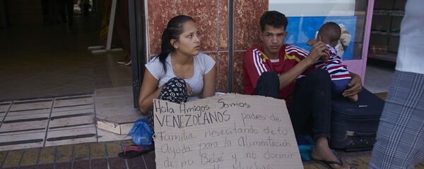 Migrantes venezolanos en Chile - Sputnik Mundo