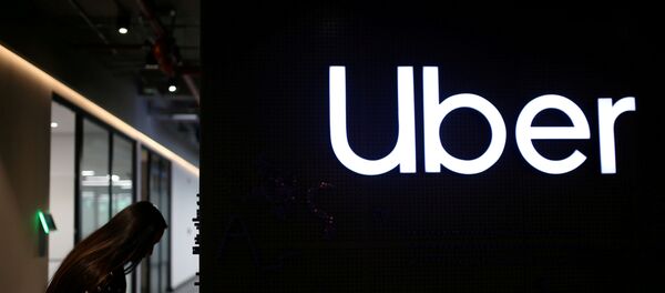 Un cartel de Uber en una de las oficinas de la empresa en Bogotá, Colombia - Sputnik Mundo