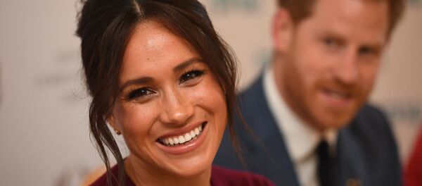 Meghan Markle, la duquesa de Sussex y esposa del príncipe Enrique - Sputnik Mundo