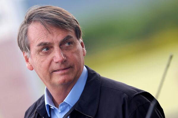 La larga marcha: bloqueos a megacaravana de migrantes hondureños - Sputnik Mundo