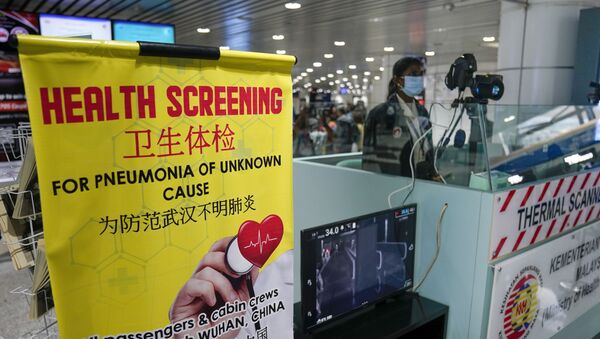 Estación de inspección sanitaria en el aeropuerto internacional de Kuala Lumpur en Sepang (Malasia) - Sputnik Mundo
