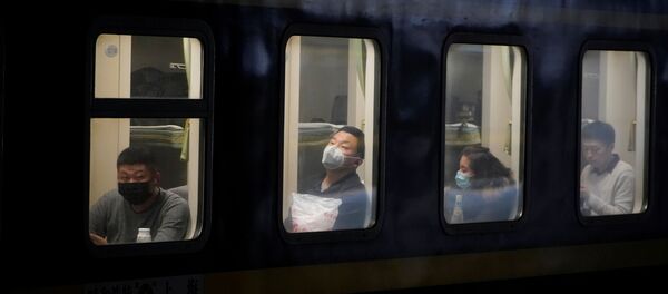 Un tren en China - Sputnik Mundo