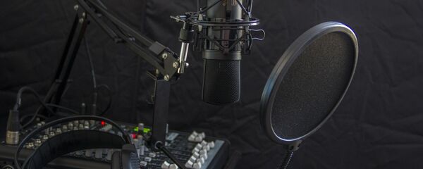 Un micrófono Un micrófono - Sputnik Mundo