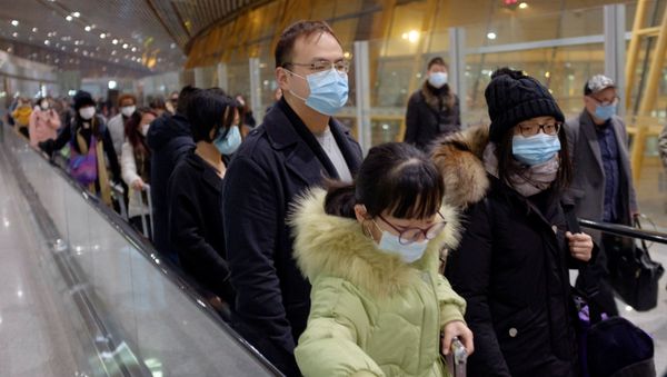 Personas en el Aeropuerto Internacional de Pekín, China Personas en el Aeropuerto Internacional de Pekín, China - Sputnik Mundo