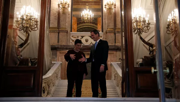 La ministra de Asuntos Exteriores española, Arancha González, y Juan Guaidó, el opositor venezolano - Sputnik Mundo