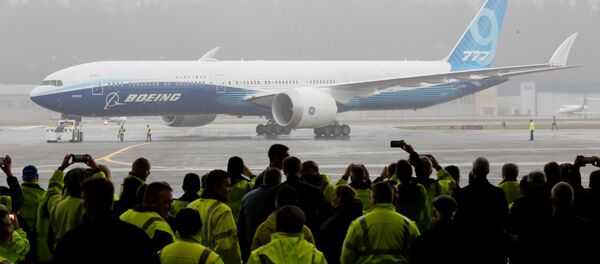 El Boeing 777X concluye con éxito su primer vuelo en EEUU El Boeing 777X concluye con éxito su primer vuelo en EEUU - Sputnik Mundo